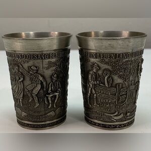 VTG FRIELING ZINN GERMANY PEWTER CUPS Set Of 2 - 3 Scenes Raised Panels 3”